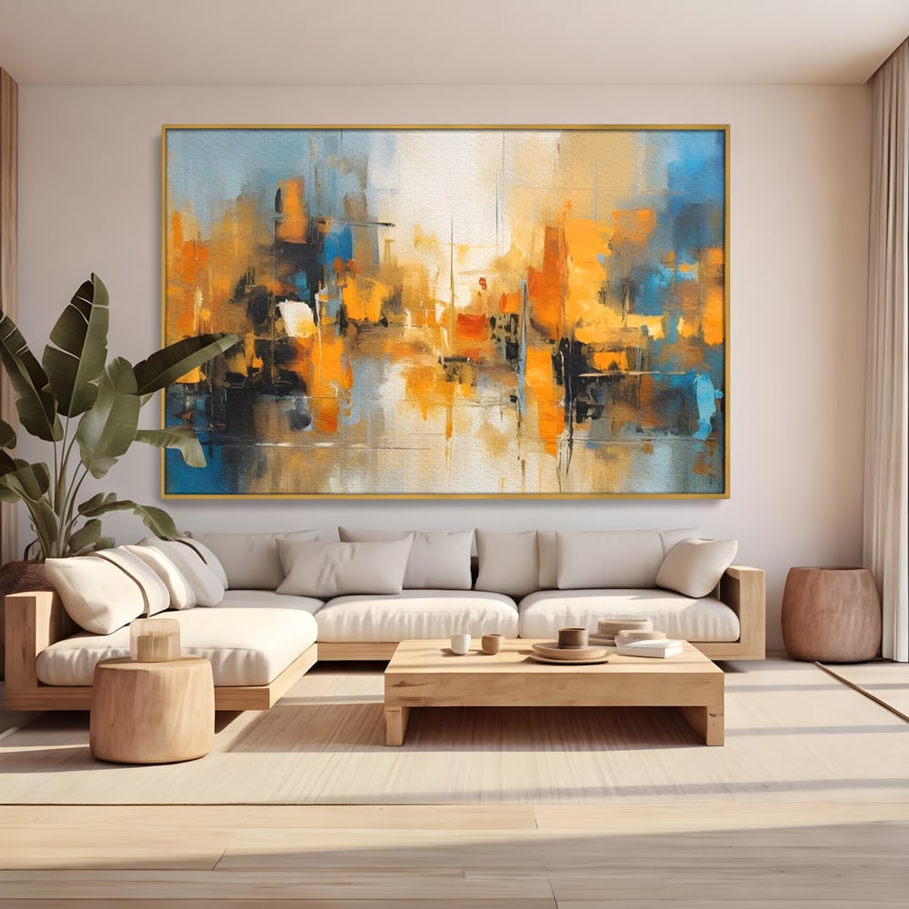 Tablou canvas cu pictura abstracta cu reflexii in apa, in rama de aluminiu auriu, pe perete intr-un living